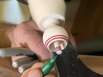 Turning a teeter totter (tipee top) 